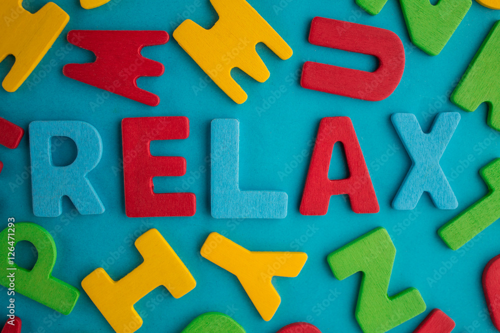 colorful words relax on blue background StockFoto Adobe Stock