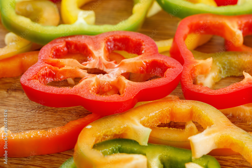 Background of fresh sliced bell peppers Background of fresh sliced bell peppers
