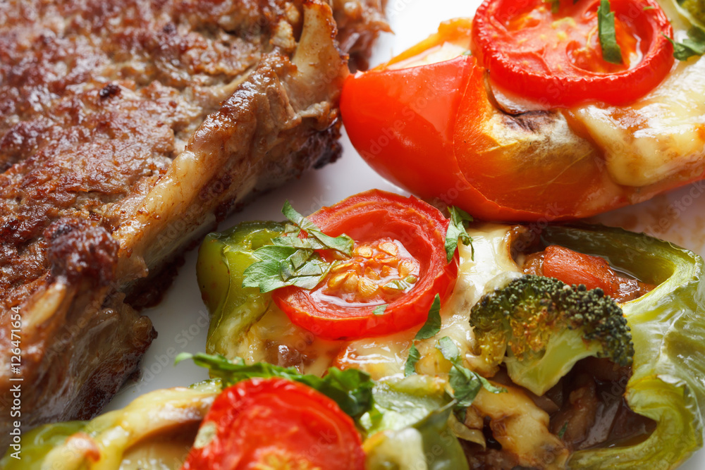 Roasted bell pepper pizza with beef chop, cheese and vegetables Roasted bell pepper pizza with beef chop, cheese and vegetables