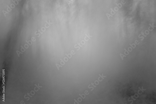 Abstract grey and black background picture from fog in night forest