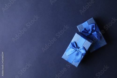 Blue present boxes on blue background