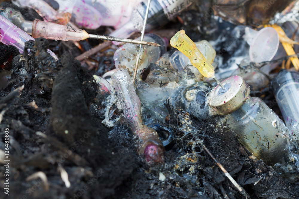 Infectious waste is burned in the environment..A garbage disposa Infectious waste is burned in the environment..A garbage disposa