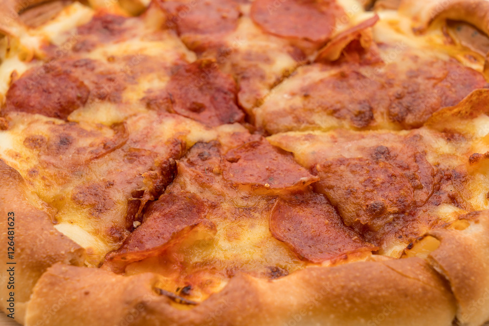 Homemade Pepperoni Pizza on white background Homemade Pepperoni Pizza on white background