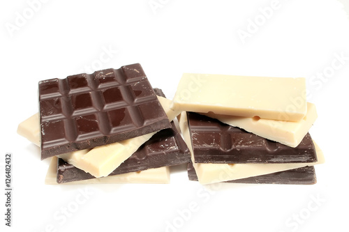 White and dark chocolate isolated on white background    