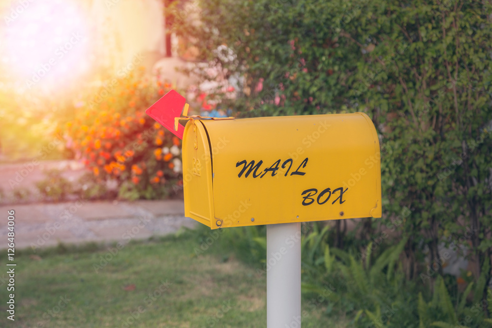 yellow Mail Box on sunset.