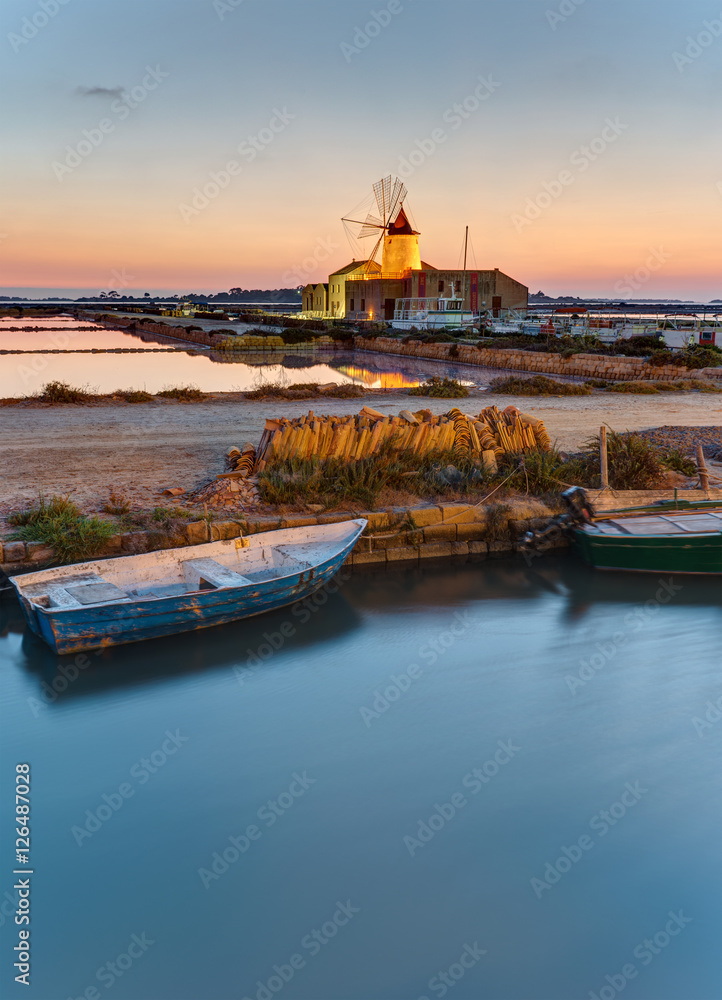 Dawn at the saltpans of Marsala in Sicily, Italy