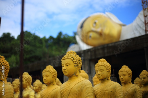 Golden Buddha of Wat Pa Sawang Bun Temple Saraburi Thailand photo