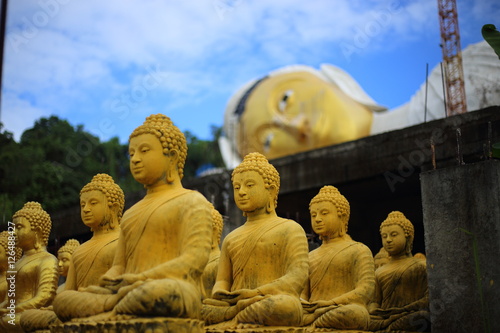 Golden Buddha of Wat Pa Sawang Bun Temple Saraburi Thailand photo