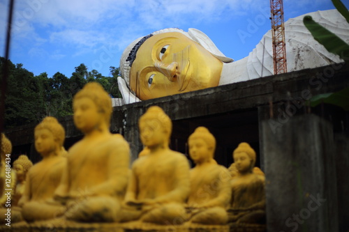 Golden Buddha of Wat Pa Sawang Bun Temple Saraburi Thailand photo