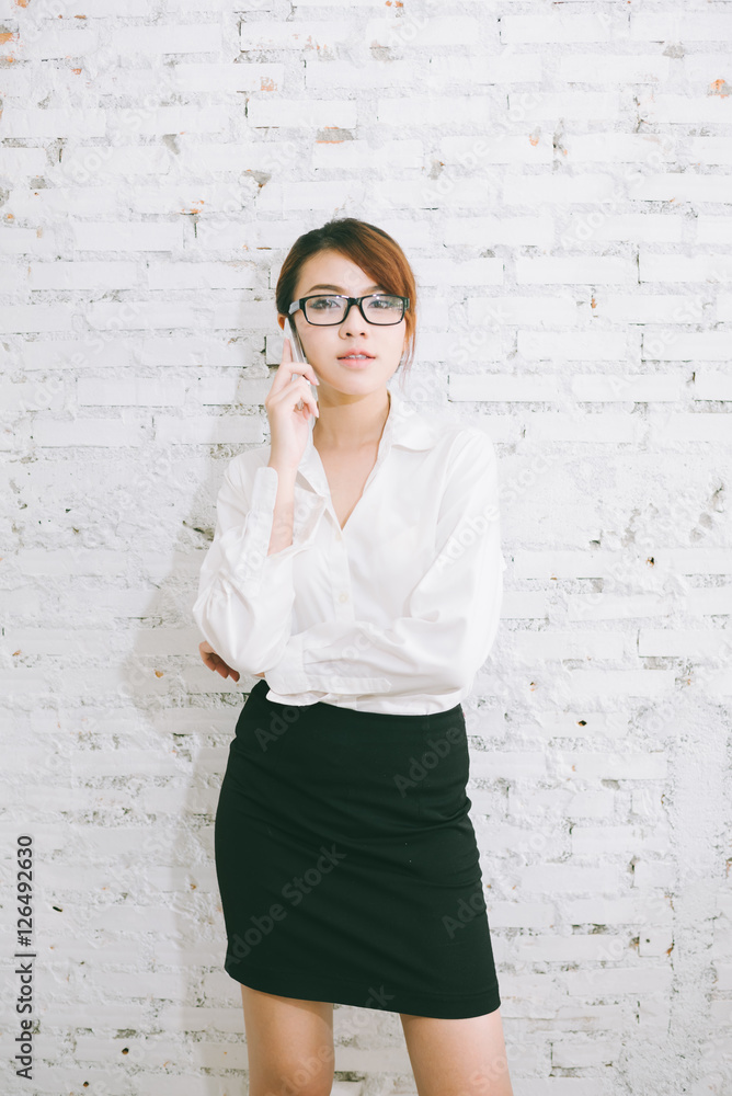 Business woman use of mobile phone Business woman use of mobile phone