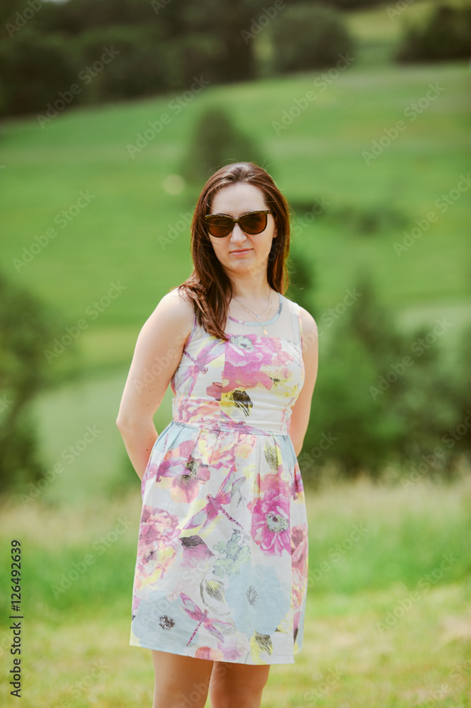 Brunette girl enjoying journey in mountains.