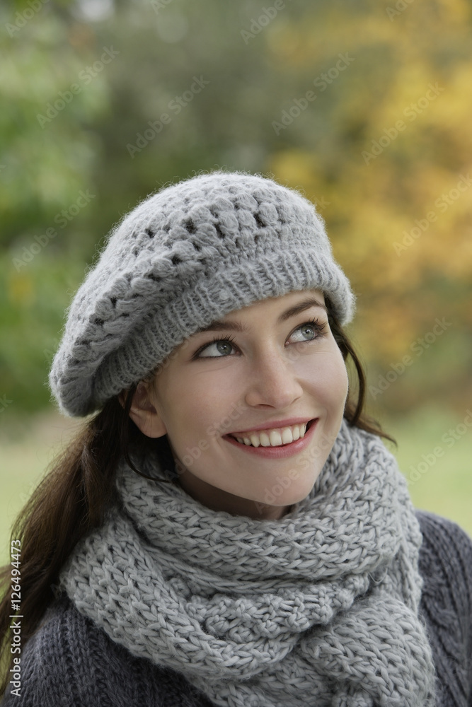 Young woman in knit hat and scarf Young woman in knit hat and scarf