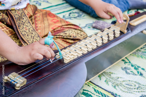 musician playing Chakhe photo