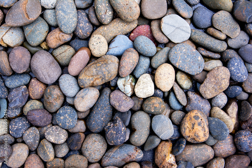Pebbles background.Gravel background.Colorful pebbles background Pebbles background.Gravel background.Colorful pebbles background