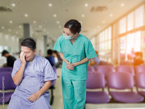 Photography Asian nurse taking care of a patient man in hospital.