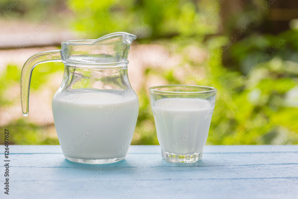 Milk in a jug and a glass Milk in a jug and a glass