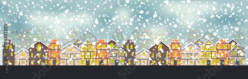 Abstract Christmas and New Year with Fabulous Houses Background. © olegganko