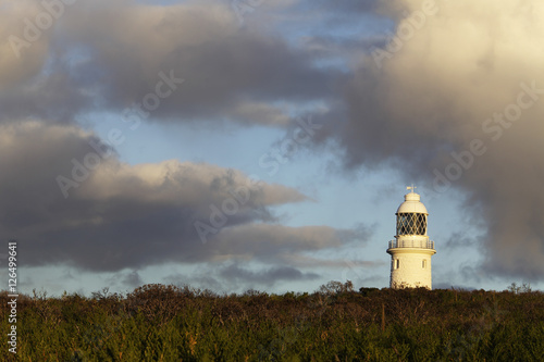 Light house with clouds as background