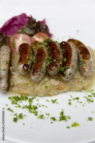traditionally bavarian bratwurst with sauerkraut