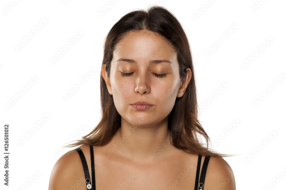 young beautiful woman with closed eyes and without makeup young beautiful woman with closed eyes and without makeup
