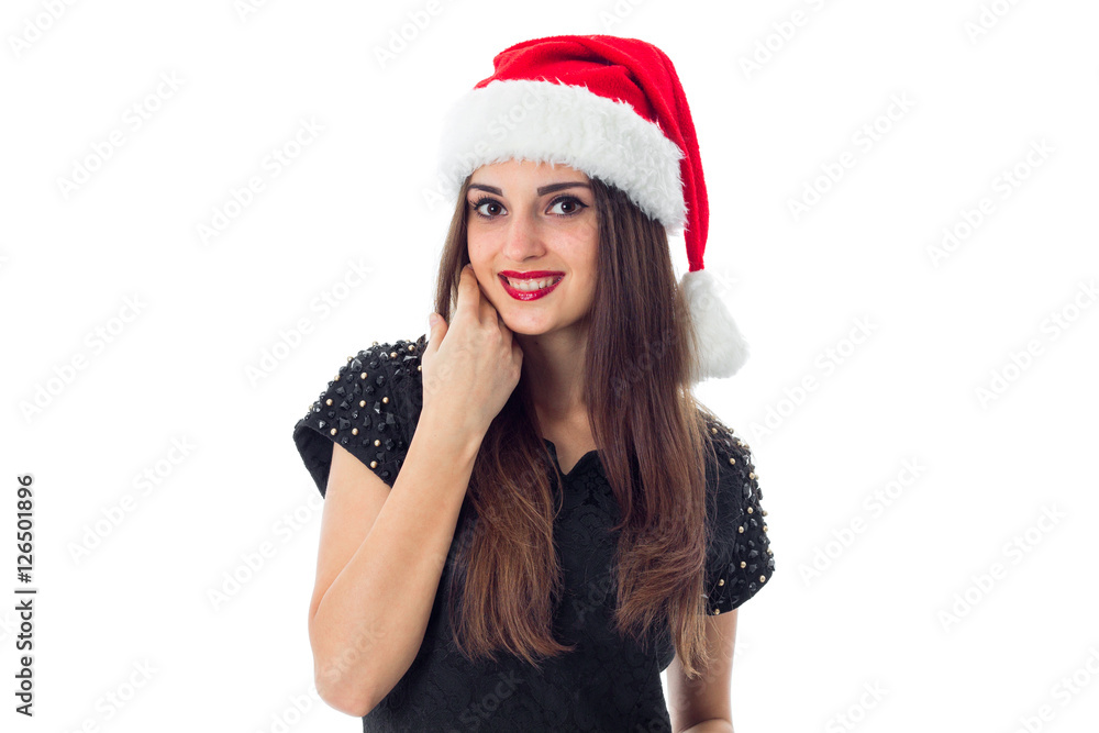 adorable brunette girl in santa hat adorable brunette girl in santa hat