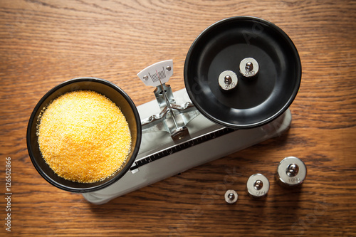 polenta on the scales with weights 40 grams