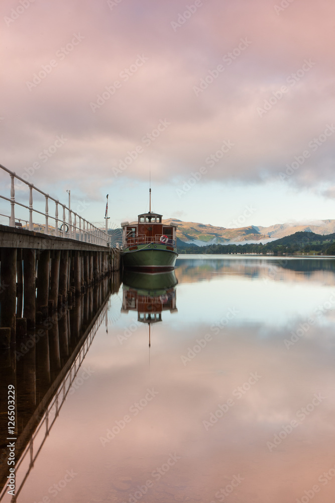 Steamboat docked on Ullswater in the Lake District, England