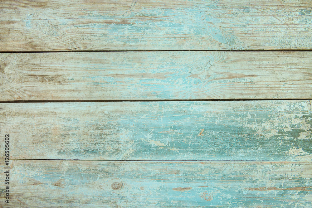 Obraz premium Old weathered wood plank painted in blue