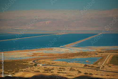 Top view from the Judean Desert on the places salt mining . The Dead sea. © marina_li_1