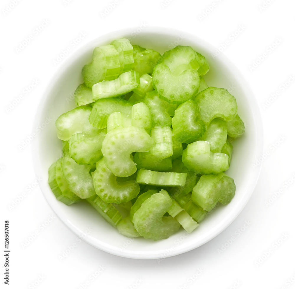 Bowl of celery isolated on white, from above Bowl of celery isolated on white, from above