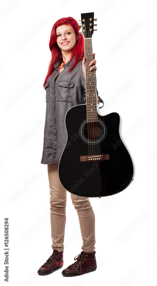 young woman playing the guitar isolated on a white background young woman playing the guitar isolated on a white background