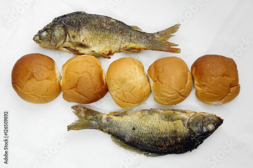 The five loaves, and the two fishes.