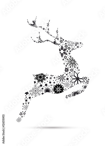 Ein springendes Rentier,
dekoriert mit Sterne, Eiskristalle und Schneeflocken.
 photo