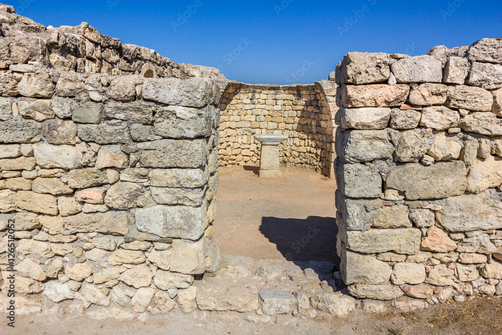 masonry walls and a table on the excavations of the ancient city