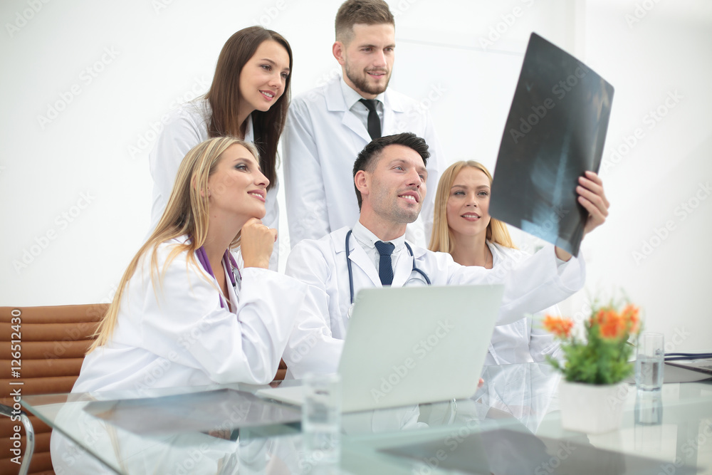 Team of medical professionals working at the medical office. Team of medical professionals working at the medical office.