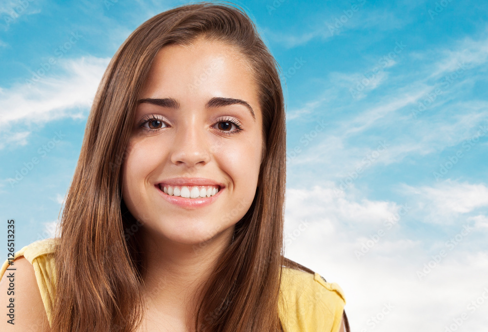 portrait of pretty girl face smiling over sky background portrait of pretty girl face smiling over sky background