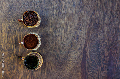 Coffee cup, beans and ground