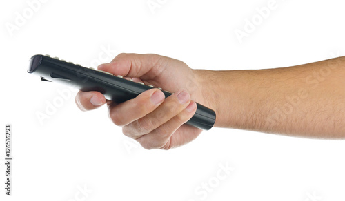 hand with remote control on white