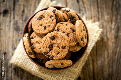 Top view and overhead shot of chocolate chip cookies in cup bow