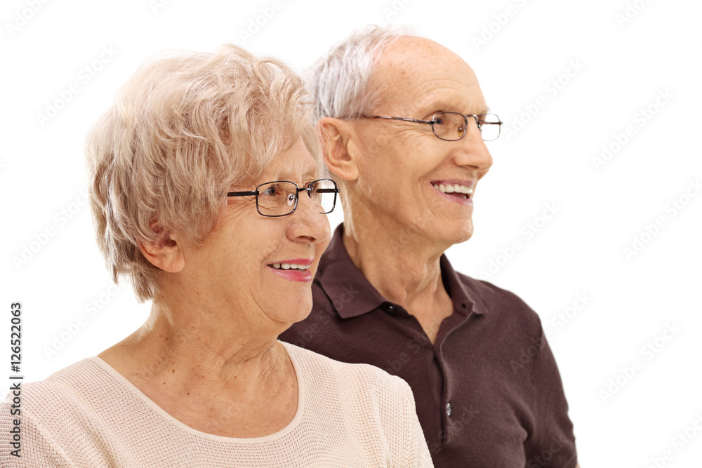 Mature man and woman looking in the distance Mature man and woman looking in the distance
