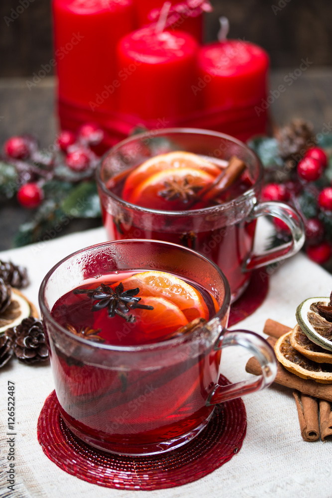 Winter hot drink with fruits and spices. Selective focus. Winter hot drink with fruits and spices. Selective focus.