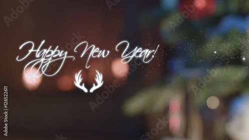 Happy New Year particle text over fireplace background