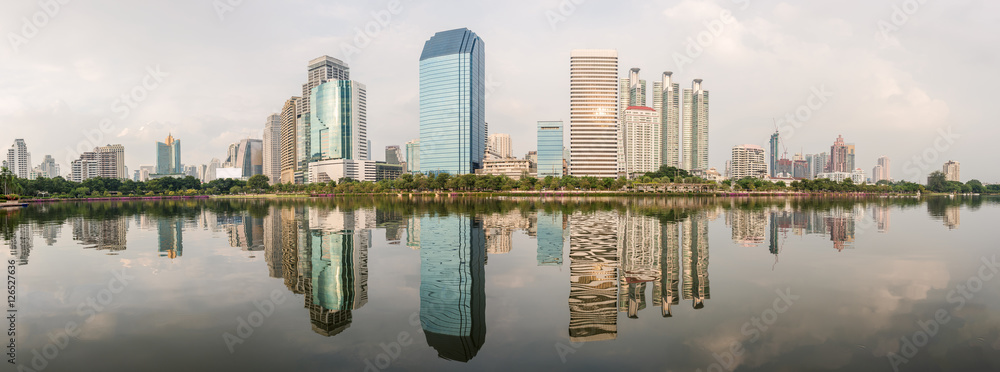 Panorama of Bangkok city with park with reflection of skyline, Bangkok, Thailand.