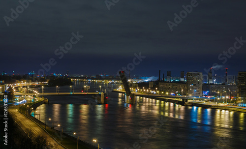 City view with open bridge over Neva river. Saint Petersburg evening view.