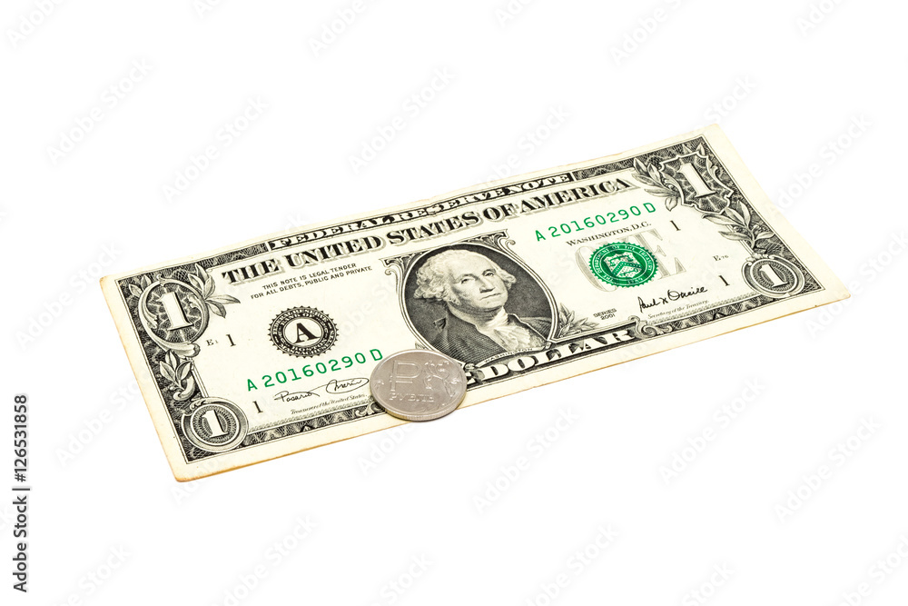 One dollar banknote and one rouble coin isolated on white background One dollar banknote and one rouble coin isolated on white background