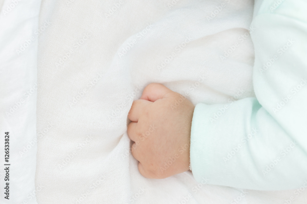 Baby hand with copy space.