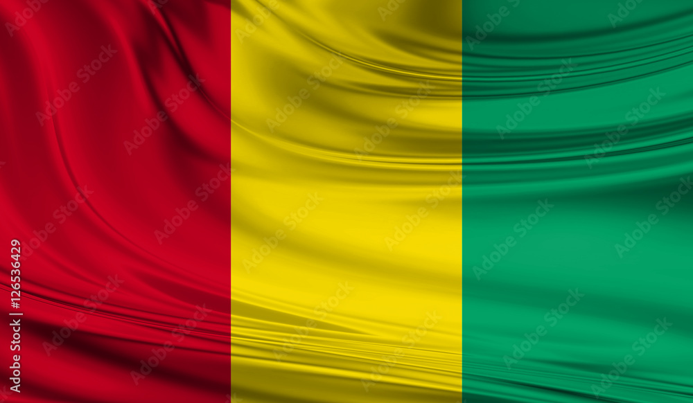 Obraz premium National waving flag of Guinea on a silk drape