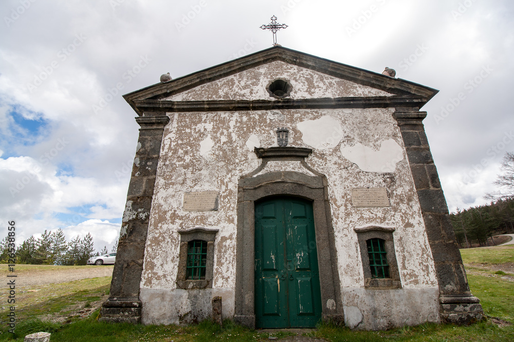 Naklejka premium Chapel on trevim hilltop