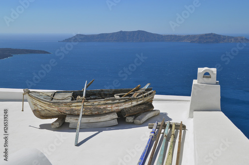 Boat on a terrace overlooking the Aegean Sea on the island of Santorini II