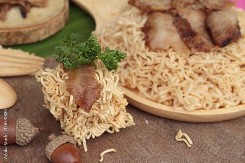 Instant noodles at blanched with baked pork delicious.